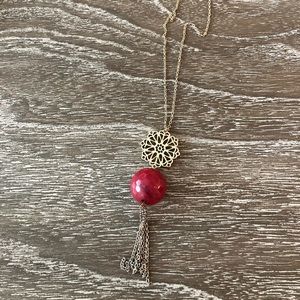 Red and gold necklace with tassel